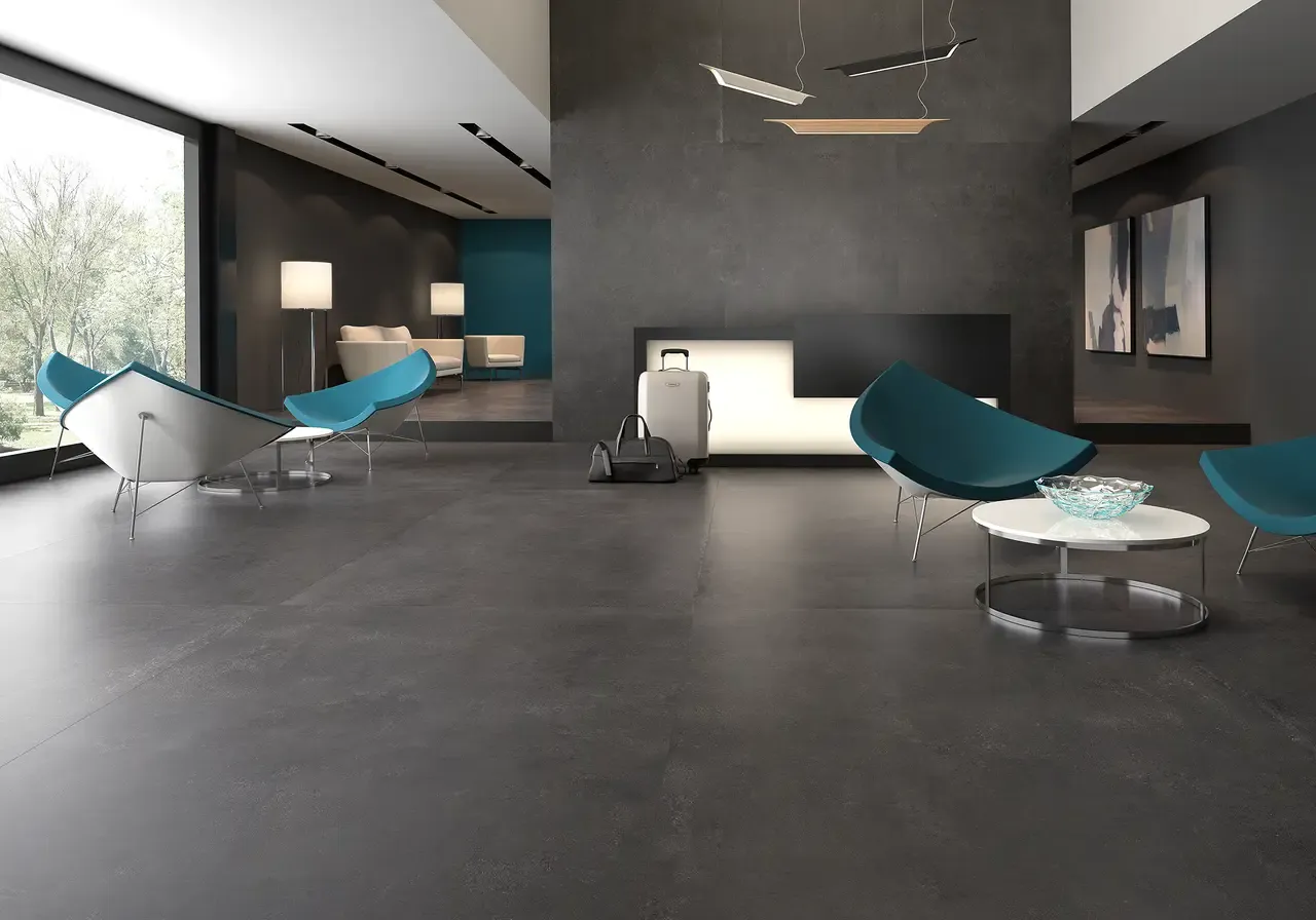 Ambiente real con porcelánico Arklam Pier 17 Zinc 6 mm — proyecto de interiorismo
