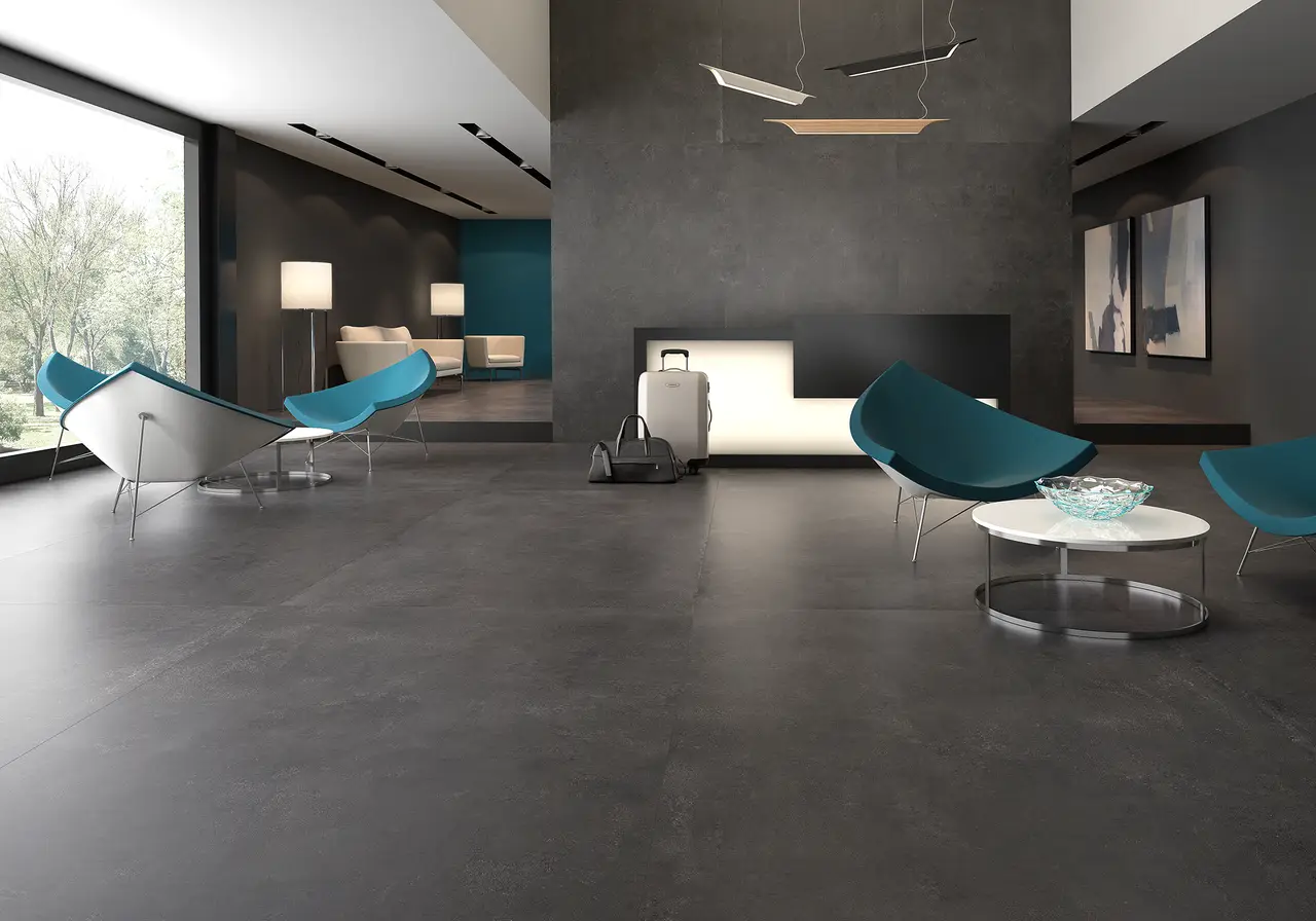 Ambiente real con porcelánico Arklam Pier 17 Zinc 6 mm — proyecto de interiorismo